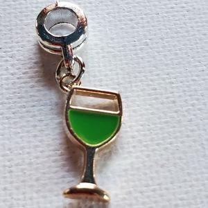 Charm. Silver and gold tone. NWOT.  Fits in Pandora snake chain Bracelet.